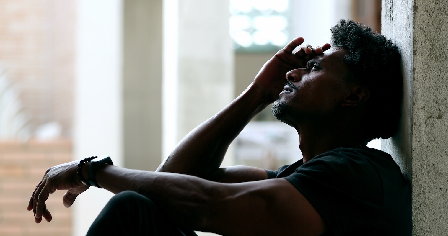 African Male struggling alone with a health crises