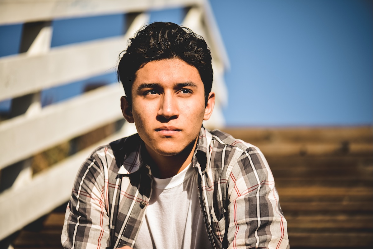 Hispanic Young male undisclosed mental health concept