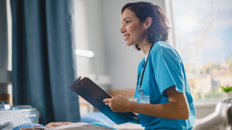 Nurse leaning in to listen attentively to a patient about blood health concerns